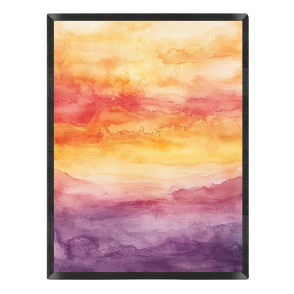 Watercolor landscape art print featuring a sunset sky with yellow, orange, and red clouds blending into purple mountains, presented in a black frame against a white background.