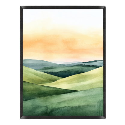 Landscape art print featuring rolling green hills under a warm orange and yellow sky, presented in a black frame against a white background.