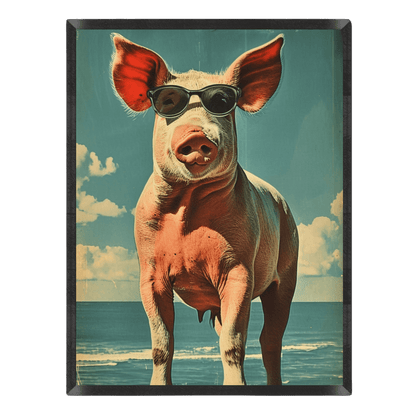 Funny retro beach poster featuring a pink pig wearing black sunglasses standing on a tropical ocean beach under a blue sky, styled with a vintage postcard aesthetic inside a thin black frame.