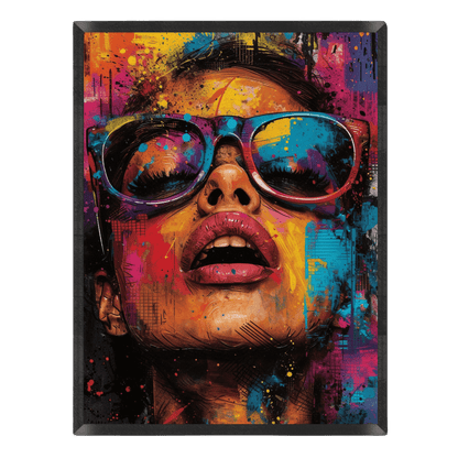 Vibrant street art portrait poster of a woman wearing colorful sunglasses looking upward, styled with bold graffiti paint splatters and brushstrokes in bright yellow, pink, blue, and orange inside a thin black frame.